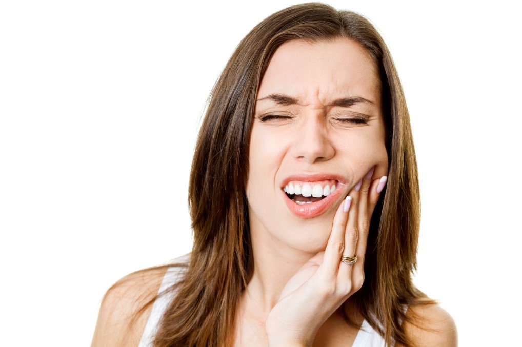 persoana care acuza o durere de dinti